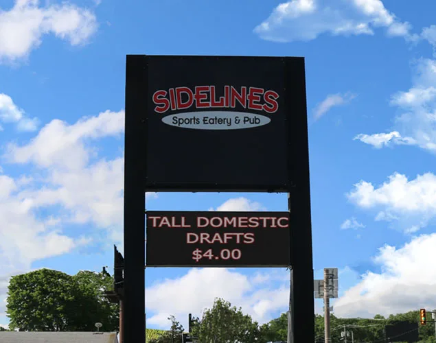 STAX outdoor LED sign at Sidelines Bar and Grill in Toledo, OH.