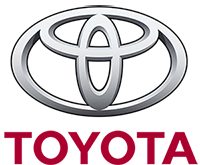 Toyota LED sign with silver overlapping oval emblem above TOYOTA in bold red letters; high-brightness, solid-state display.