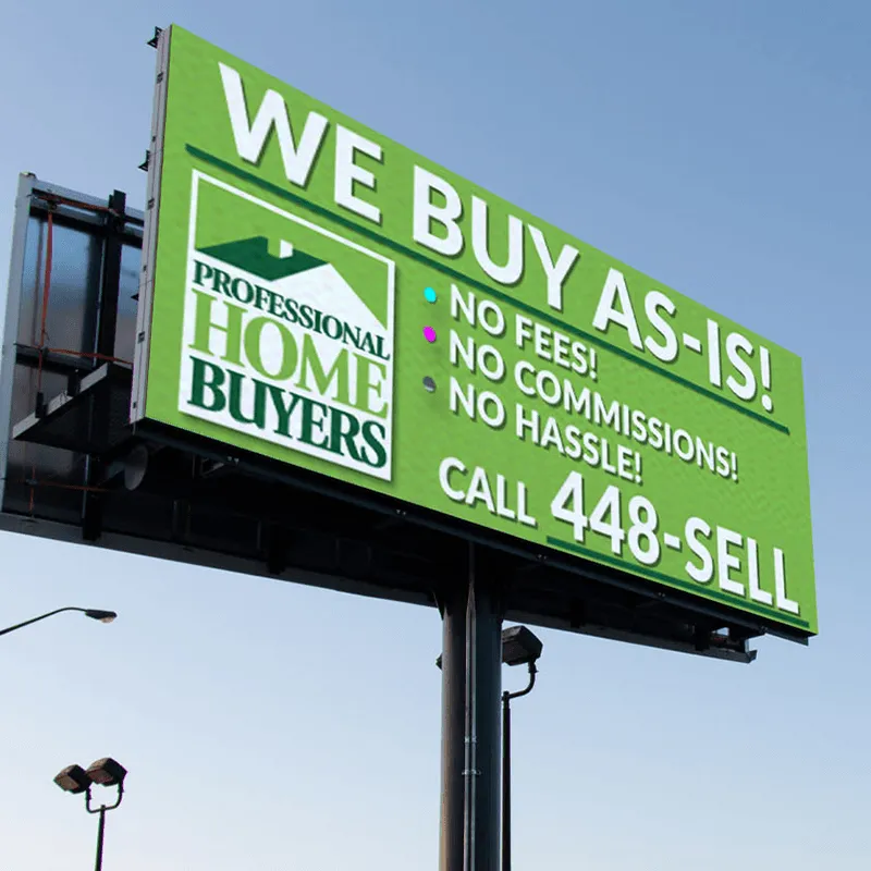 An LED electronic message center displays “We Buy As-Is! No fees! No commissions! No hassle! Call 448-SELL” alongside the Professional Home Buyers logo on a high-brightness green background.