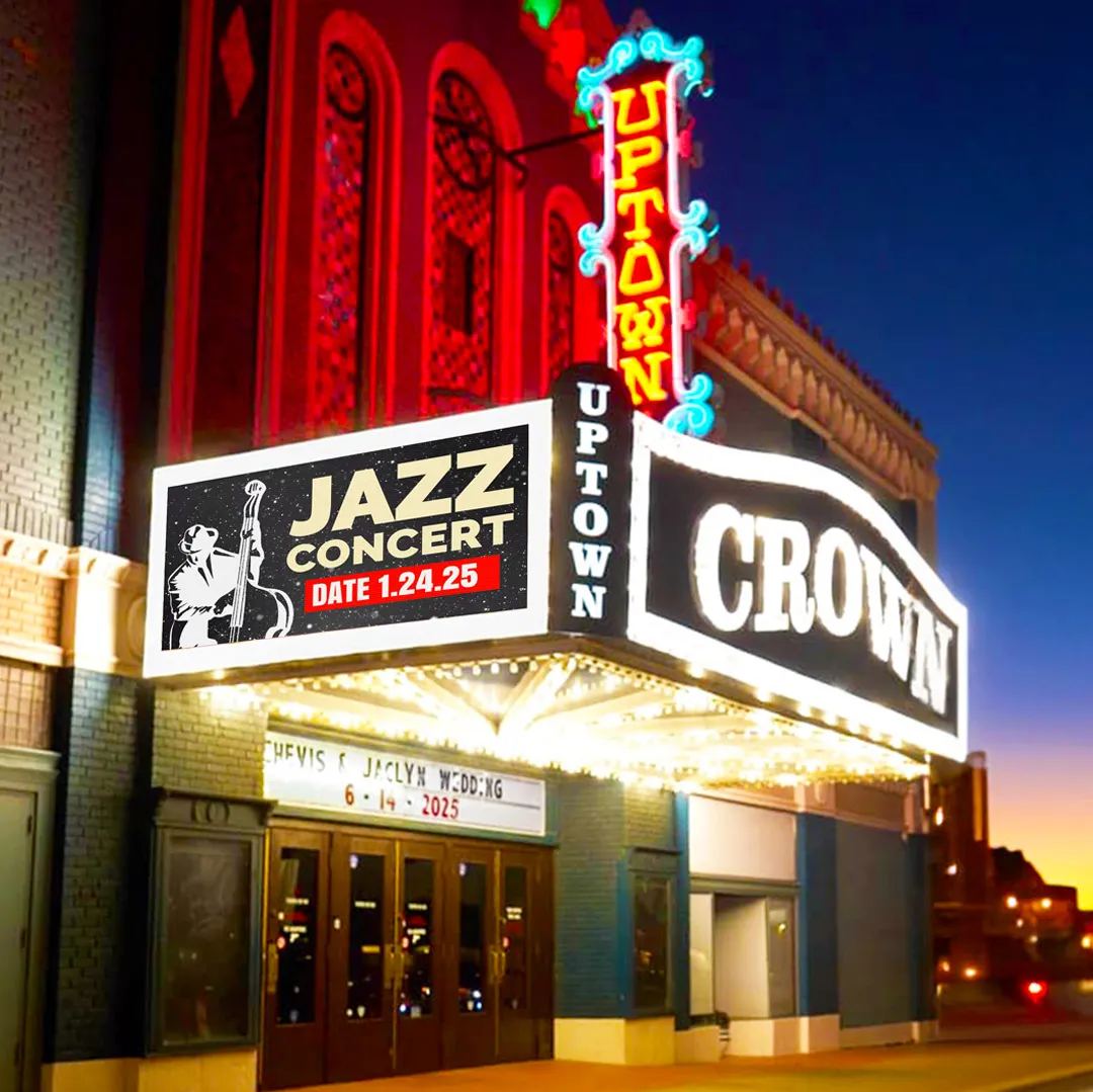 A high-brightness LED theater marquee displays "JAZZ CONCERT Date 1.24.25" alongside an image of a bass player. Solid-state electronic message centers for UPTOWN and CROWN are mounted above, with the evening sky and building facade visible in the background.